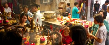 Chinese-Malay worshipers in Georgetown's Kuan Yin Teng Temple. Photo credit Nicolas Fleury.