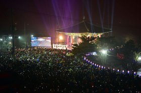 South Koreans gather in front of a traditional pavilion during a countdown event to celebrate the New Year at Imjingak peace park in the border city of Paju, South Korea